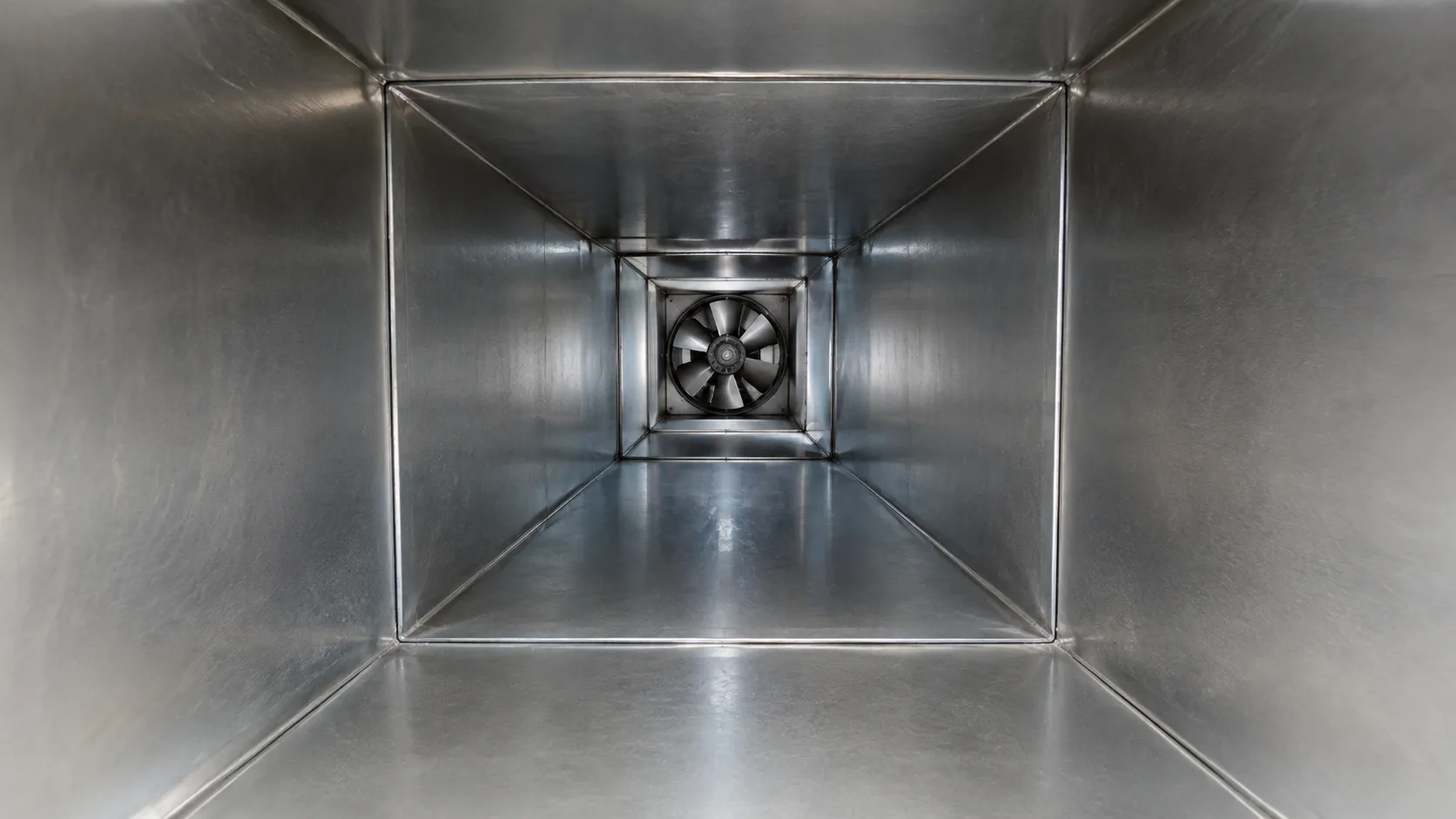 Conceptual stock-style view of cleaned commercial exhaust ductwork